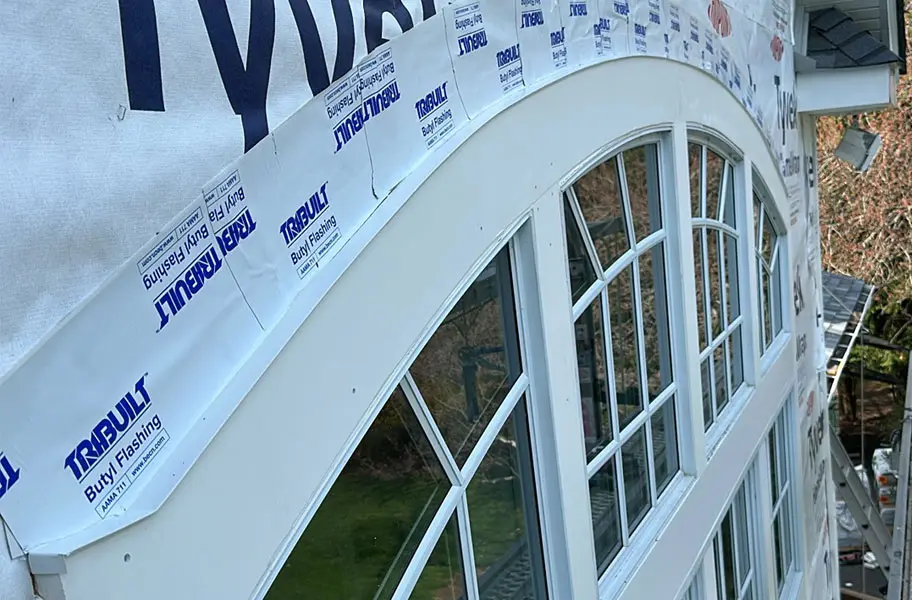 Siding installation around windows, NJ home